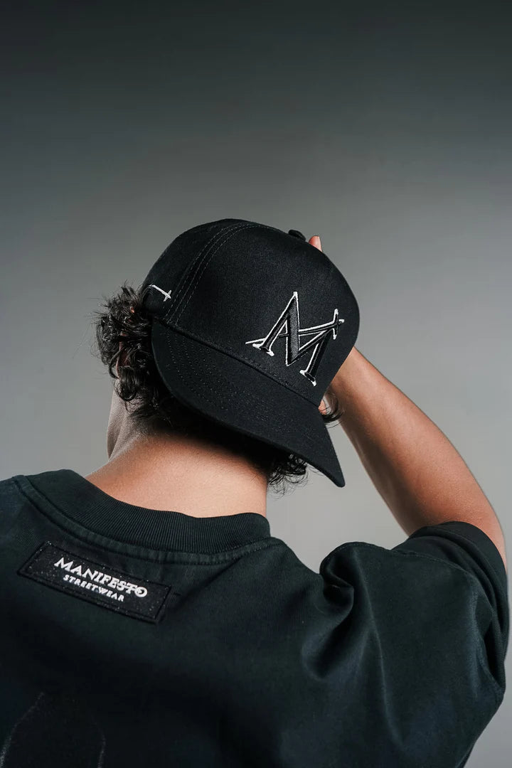 Manifesto gorra peccatori color negro