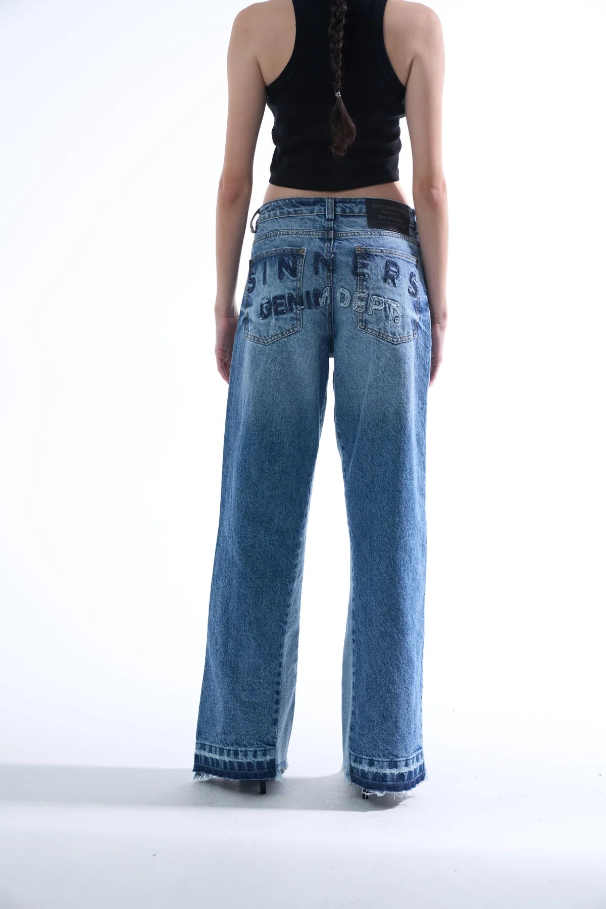 Sinners embroidered flared jeans